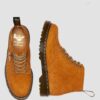 101 Fabriquées en Angleterre Bottines en daim avec détails métalliques 101 Fabriquées en Angleterre Bottines en daim avec détails métalliques