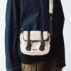 SATCHEL 7 POUCES Sacoche en cuir et fausse fourrure SATCHEL 7 POUCES Sacoche en cuir et fausse fourrure